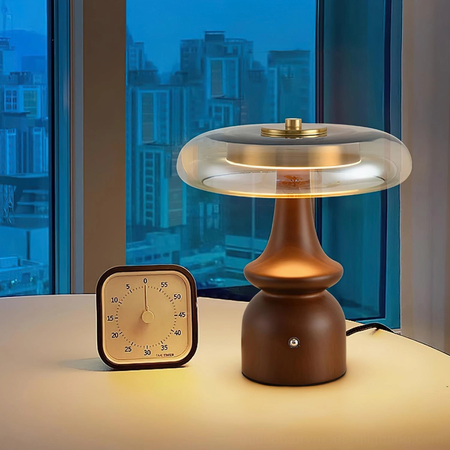 Nova table lamp close-up of push-button control switch and brass hardware with translucent glass dome