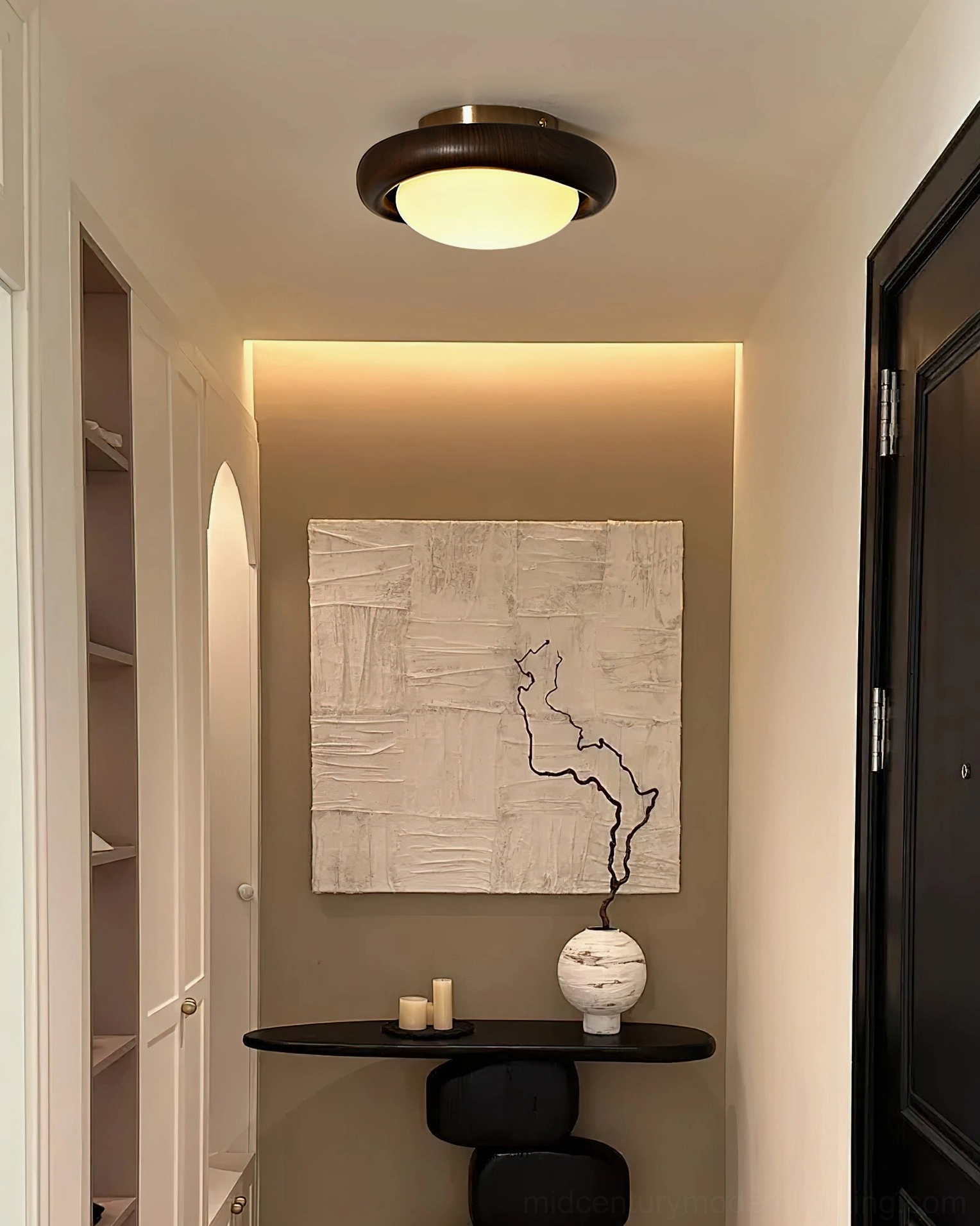 Novi warm light ceiling fixture in hallway creating ambient lighting with neutral modern decor