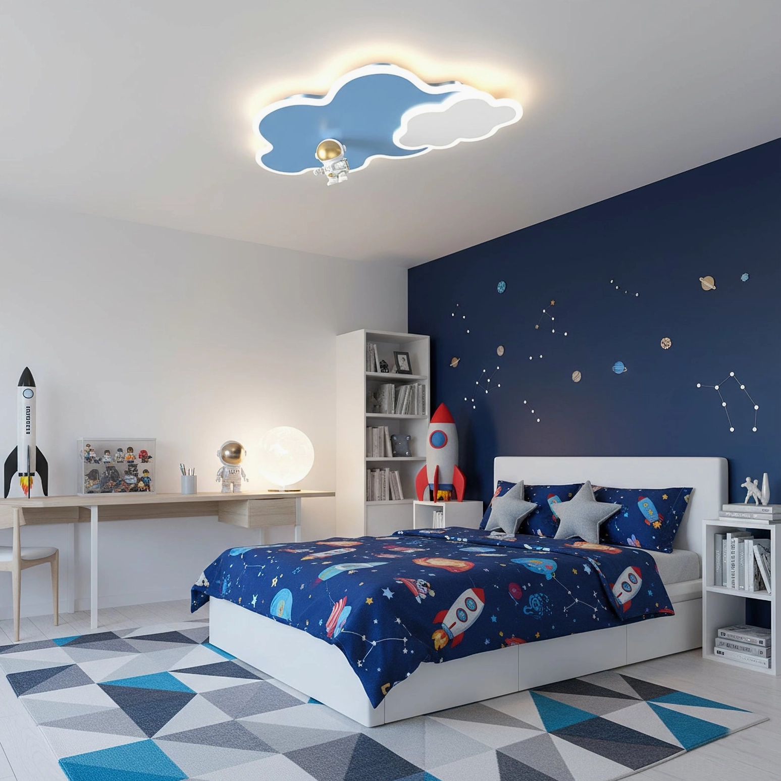 Nuages ceiling light in space-themed kids bedroom with navy blue accent wall and galaxy bedding