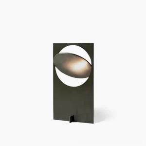 OBJ 01 minimalist table lamp with matte black metal finish and warm LED light, front view on white background, geometric crescent cutout design