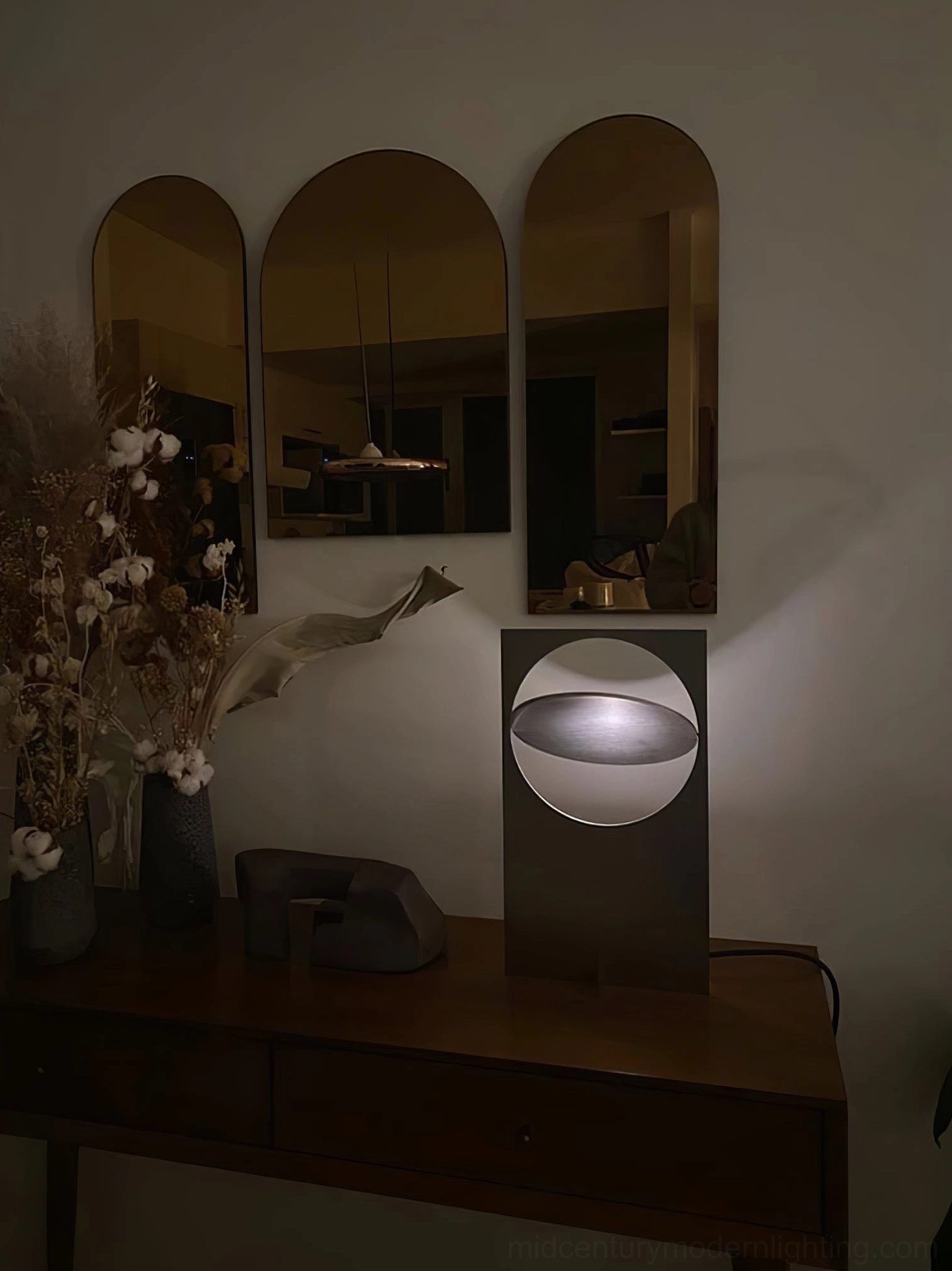 OBJ 01 matte black table lamp three-quarter angle, integrated LED warm light, geometric brutalist design, desktop or nightstand placement