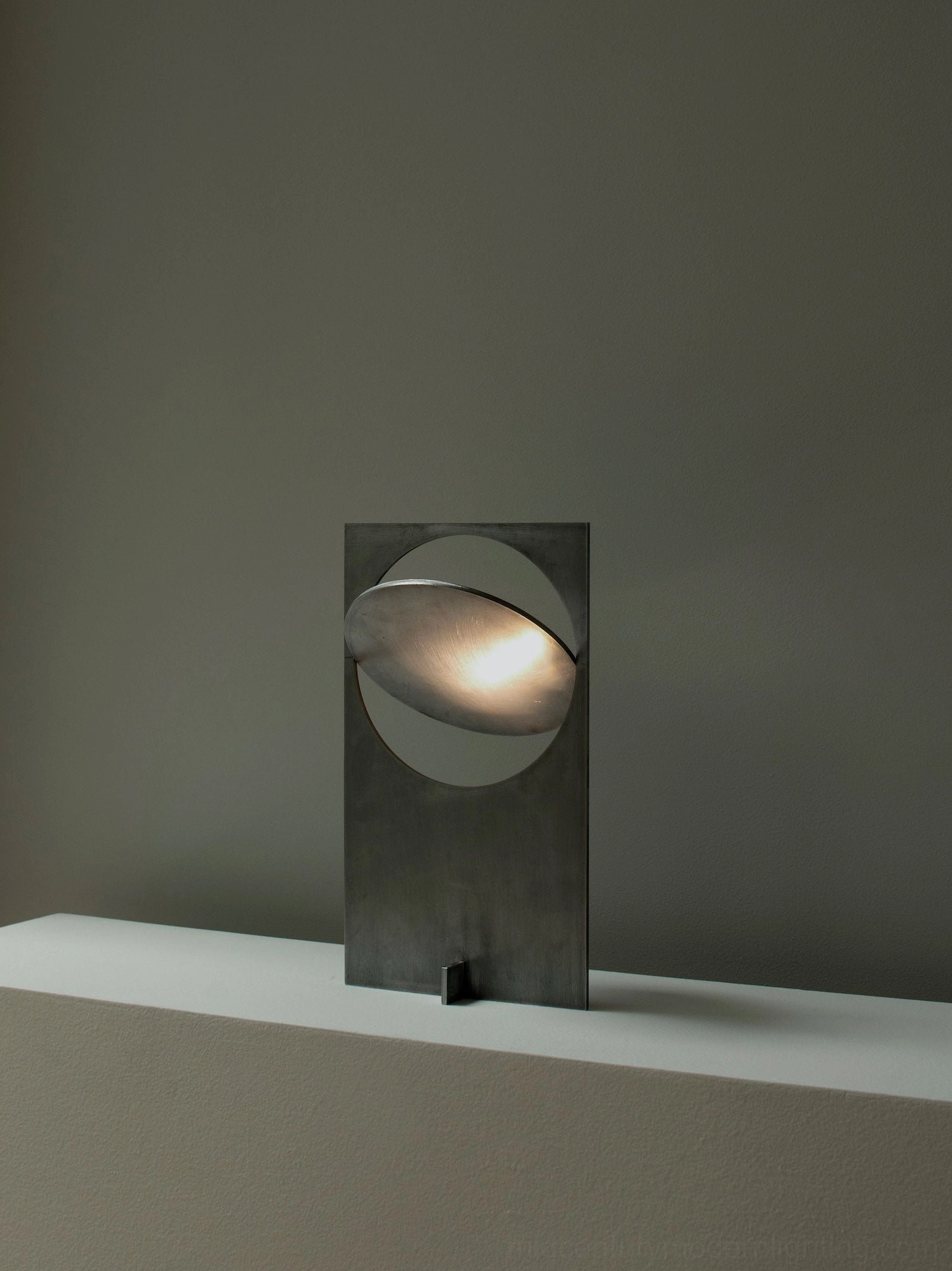 OBJ 01 table lamp in design-forward interior, geometric lighting piece on console table, contemporary home décor styling with negative space