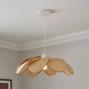 Odilia rattan pendant light installed in minimalist residential ceiling corner, three-quarter side angle showing organic petal layers and warm ambient glow
