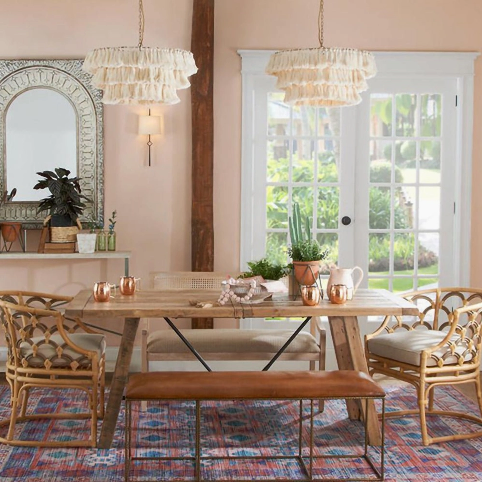 Off-white neutral tassel pendant light creating soft diffused glow in minimalist boho space