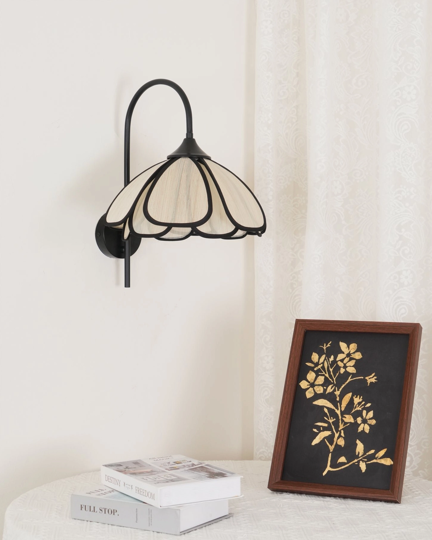 Okai mid-century modern wall sconce with botanical petal design and elegant finish