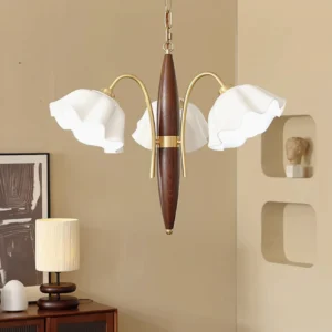 Olina flower ceramic chandelier displayed in vintage living room with side table and wall art, four lamp heads with warm brass hardware and wood frame