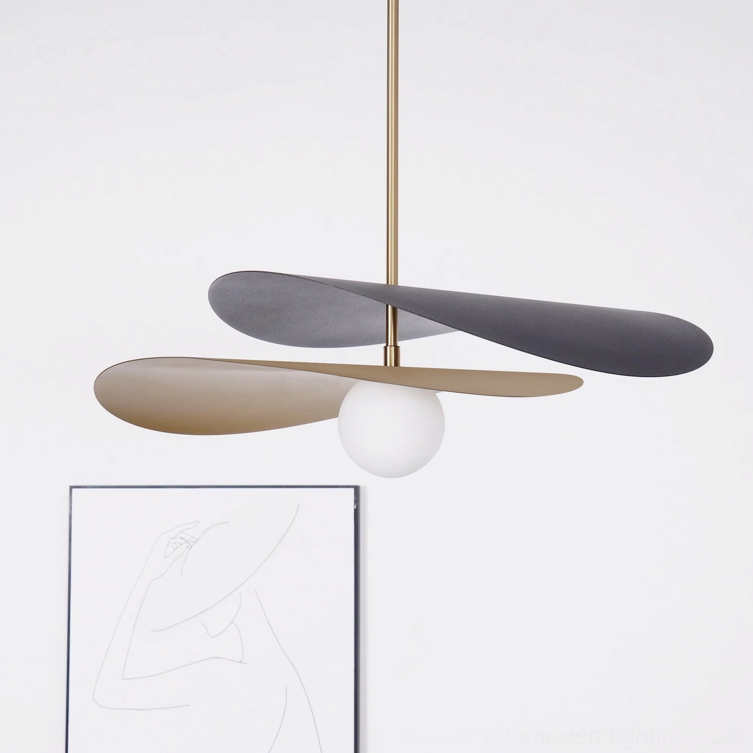 Olivia mid-century chandelier illuminated showing warm white glass globe glow and petal shadows