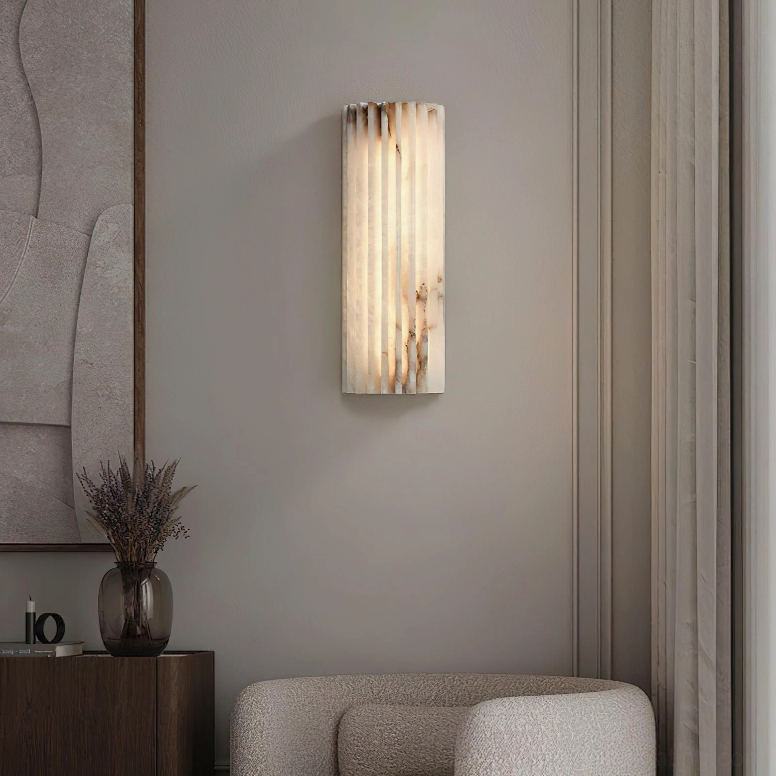 Close-up detail of Ondas alabaster sconce fluted channels and natural stone veining pattern