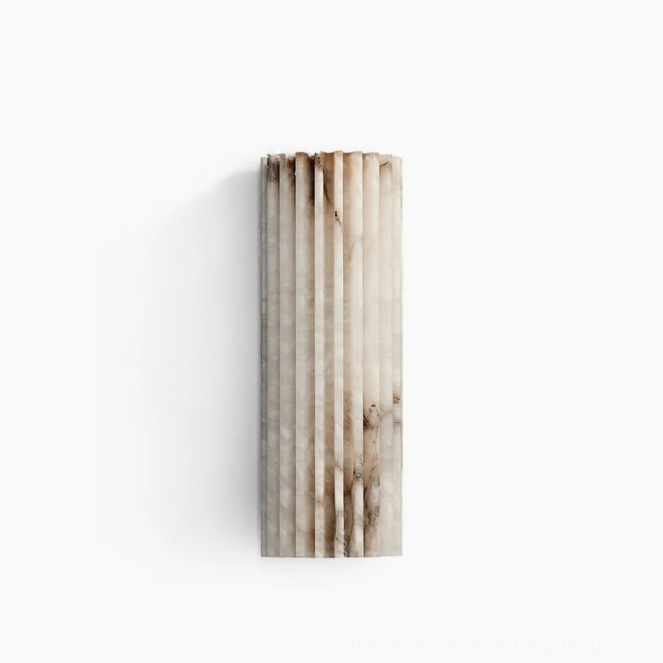 Ondas alabaster sconce installed in contemporary hallway, minimal aesthetic with warm stone glow