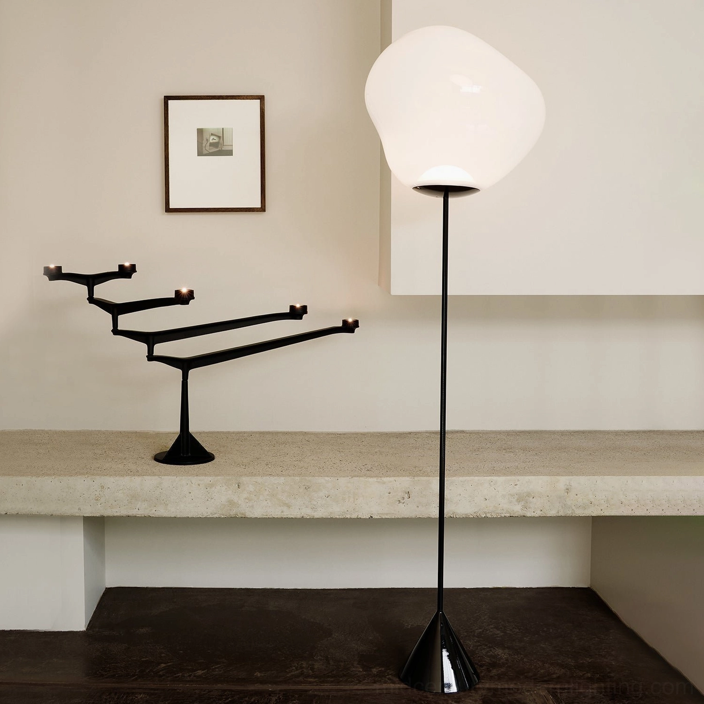 Opal white Lava Slim Floor Lamp in minimalist entryway with black metal candelabra, contemporary entrance lighting