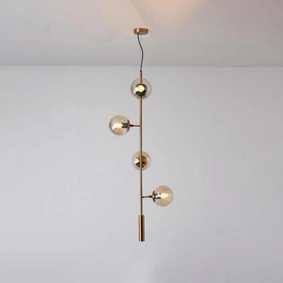 Multi-orb cluster pendant chandelier with various glass globe colors and brass hardware