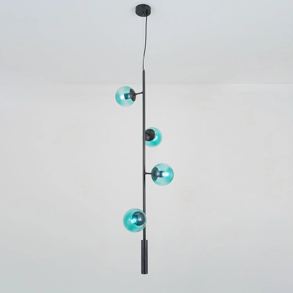 Blue glass orb pendant light with black metal frame, modern fixture detail
