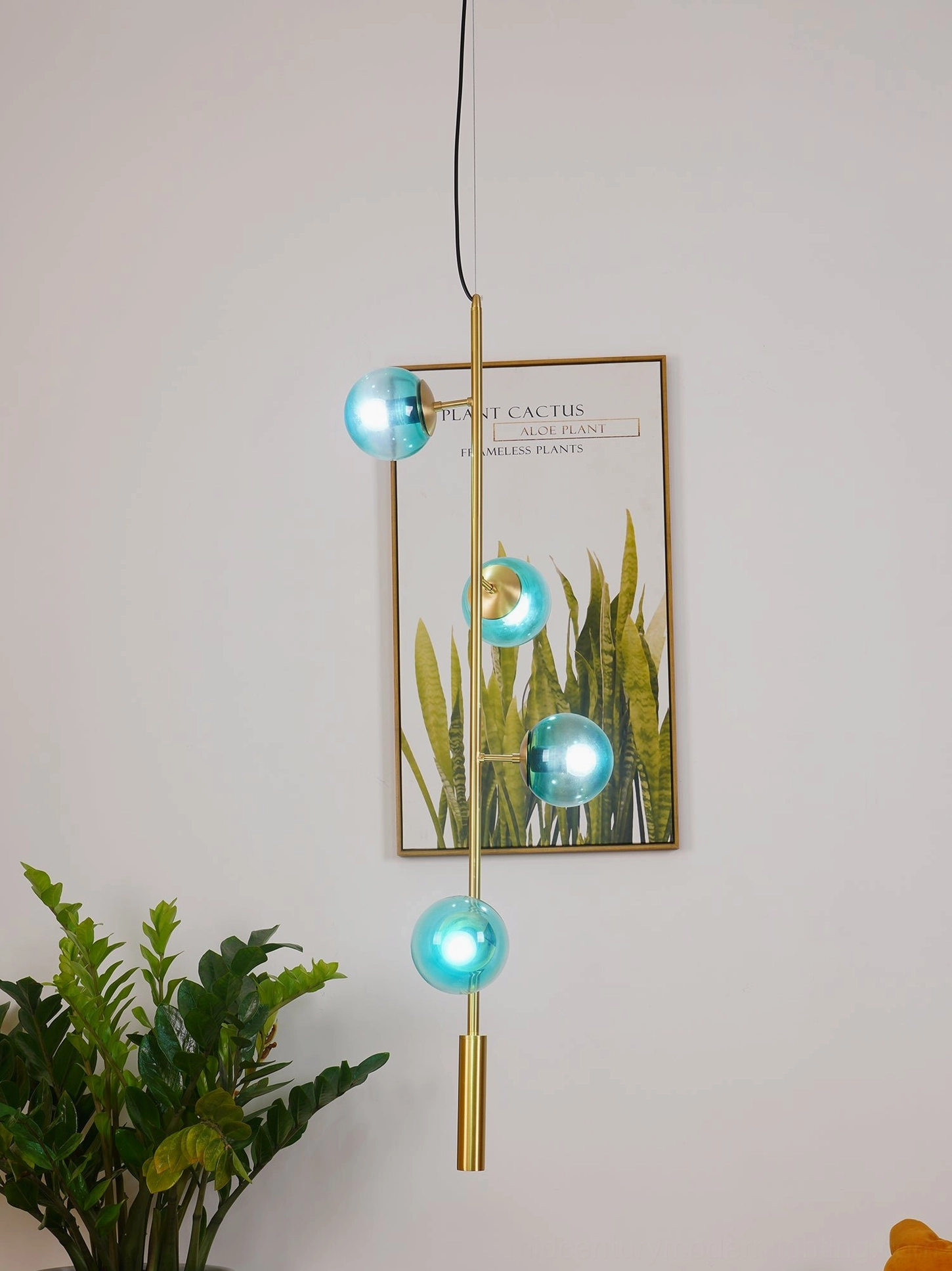 Contemporary orb pendant light with multiple glass globes in minimalist interior design