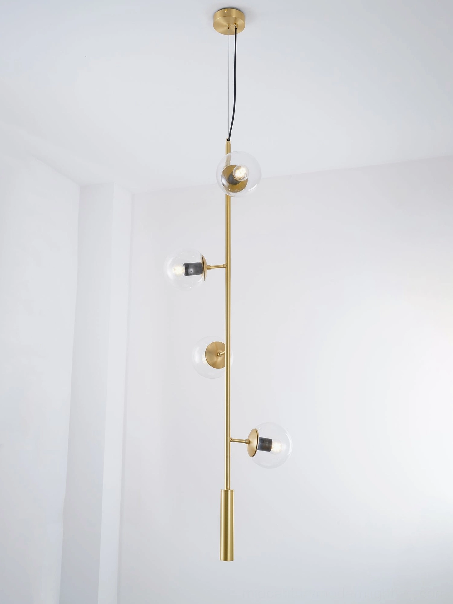 Orb pendant light installed in contemporary dining room with statement ceiling fixture