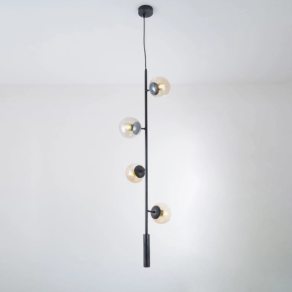 Orb pendant light with smoke grey glass and brass suspension for modern homes