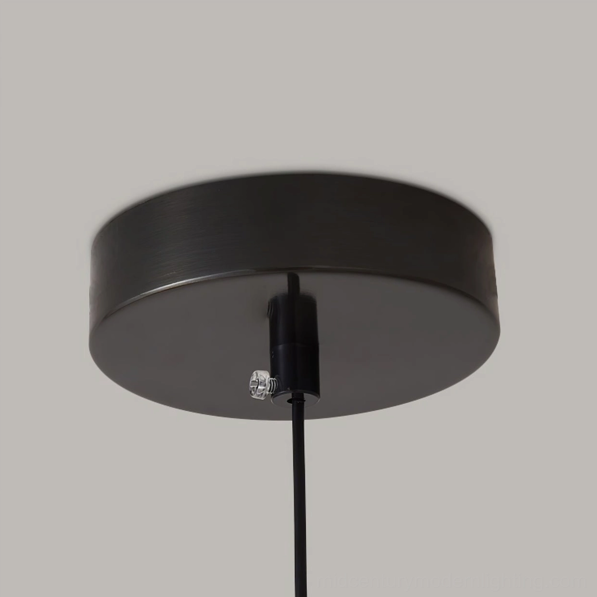 Four-orb Orbet pendant lamp with black metal finish showing complete fixture design
