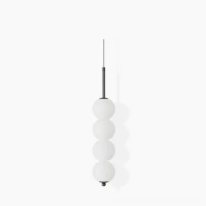 Orbet pendant lamp with four milk glass orbs and black metal hardware against white background