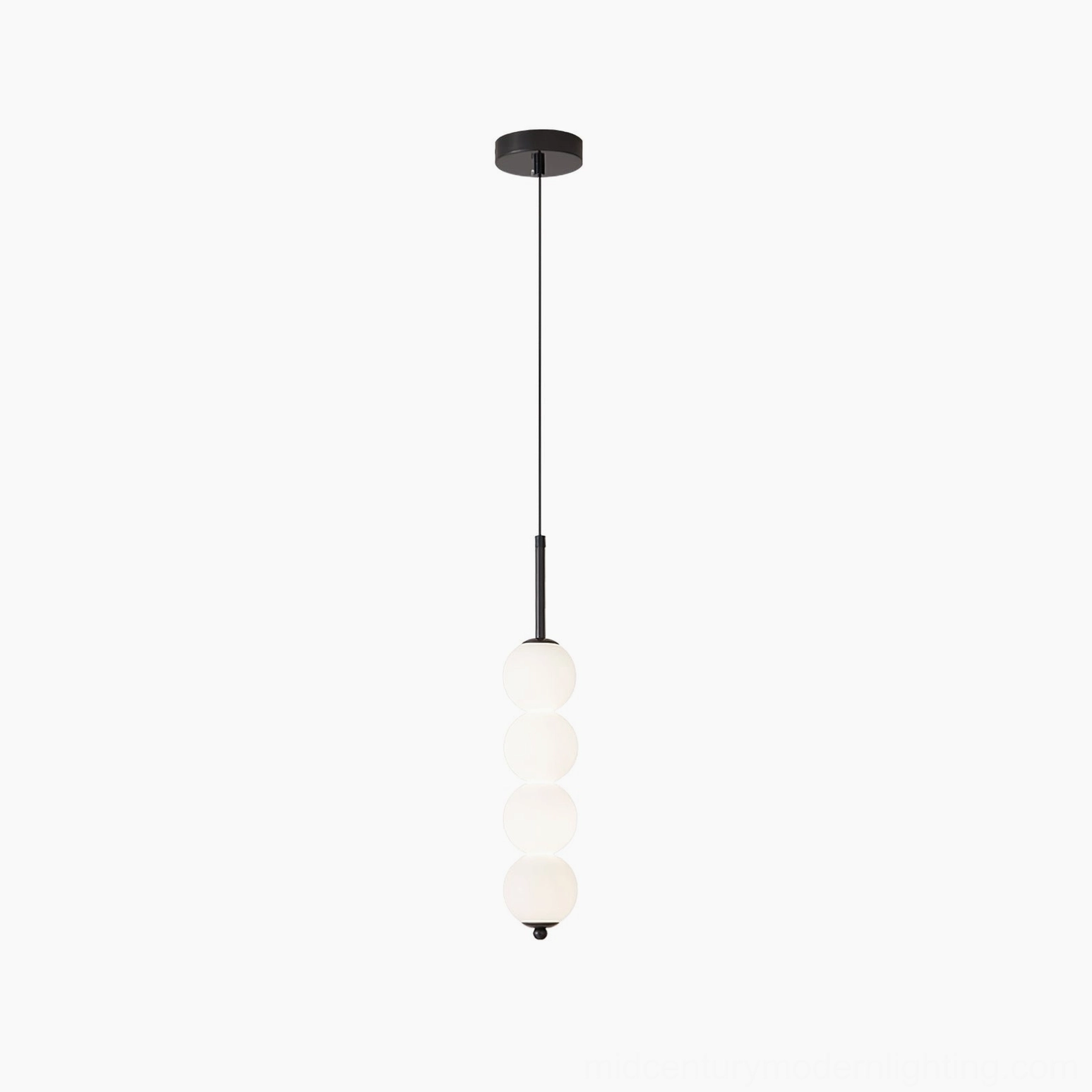 Five-orb Orbet pendant lamp illuminated showing soft even light diffusion