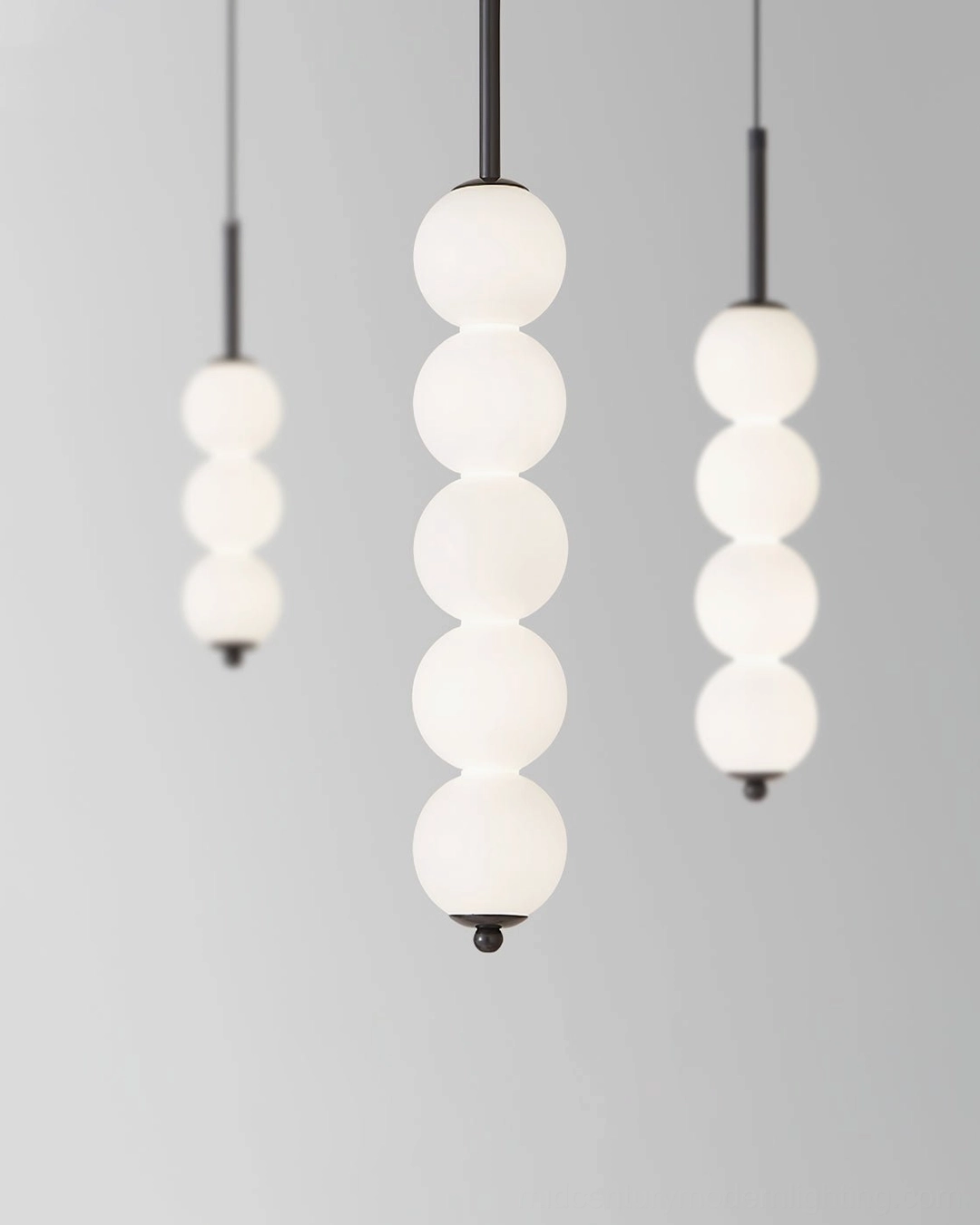 Orbet eight-orb pendant lamp with long drop for tall ceiling installation