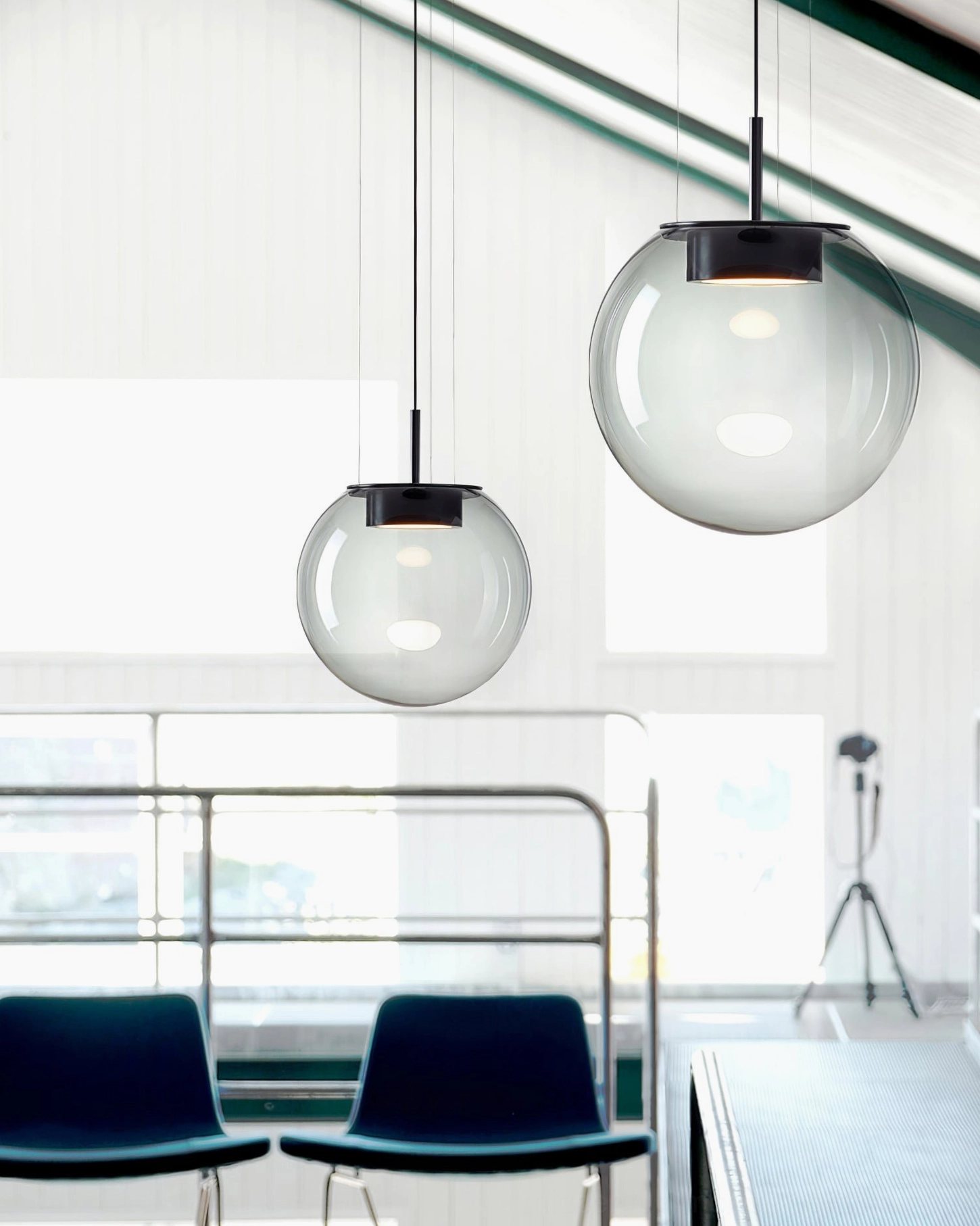 Orbis clear glass pendant lamps with natural daylight - modern lounge space contemporary spherical fixtures