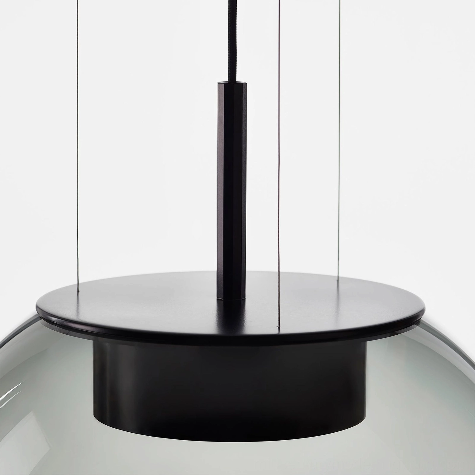 Orbis pendant lamp front view - minimalist modern sphere with geometric top cut and black hardware