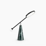 Orbit green marble table lamp with black metal adjustable neck and white sphere shade, front studio view