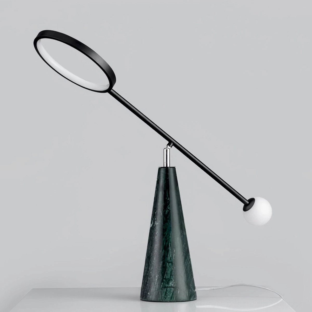 Orbit green marble table lamp close-up detail shot showing marble texture and black metal frame