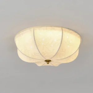 Orchid fabric ceiling light installed on bedroom ceiling casting warm glowing illumination creating intimate ambiance