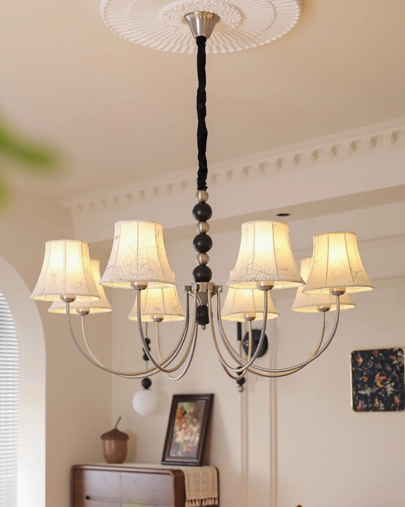 Multi-head fabric chandelier with sculptural metal frame and fabric diffusers, ambient lighting detail view
