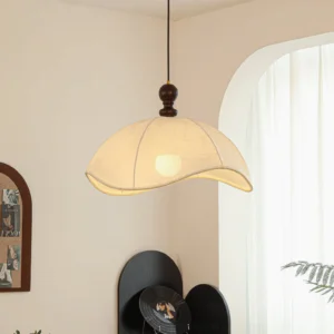 Oriente pendant light installed in French style interior with arched window, warm vintage aesthetic ambiance