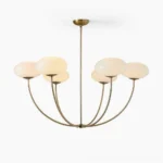 Orillia brass chandelier with opal glass shades front view studio photography