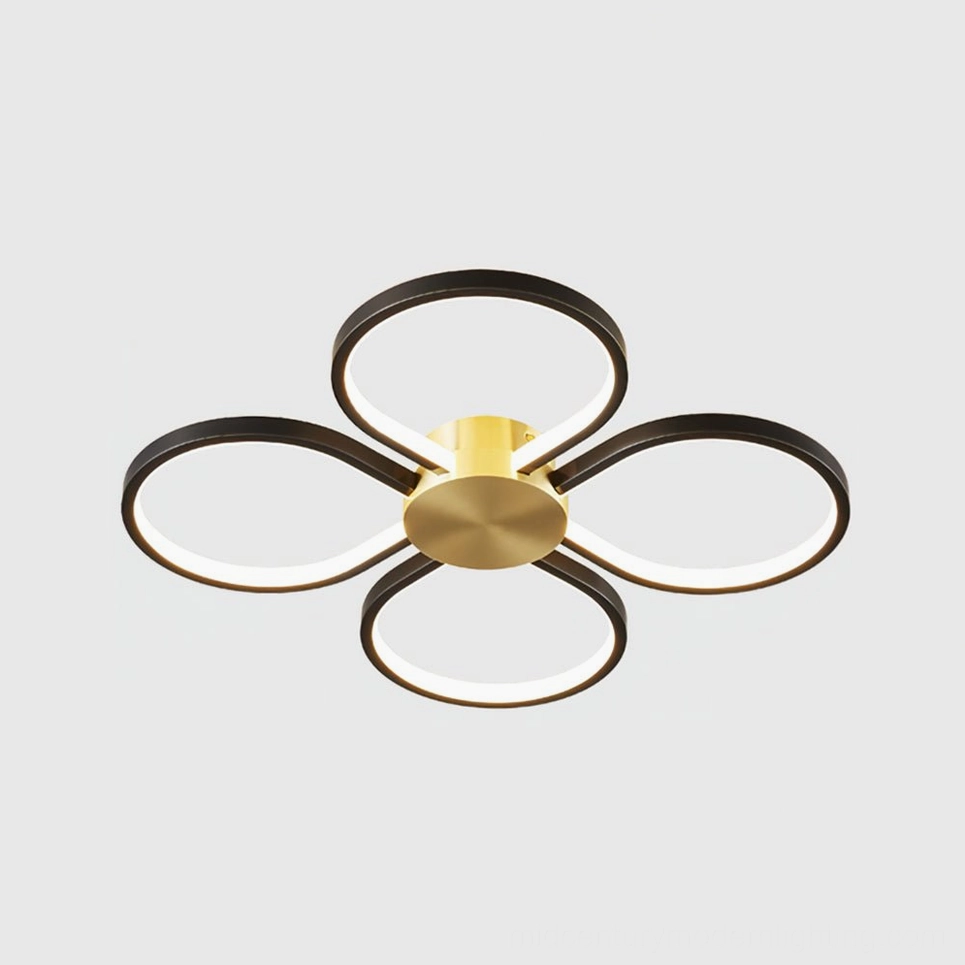 Orion four-leaf clover LED ceiling lamp black and brass detail finish, complete product studio photography showing geometric petal form