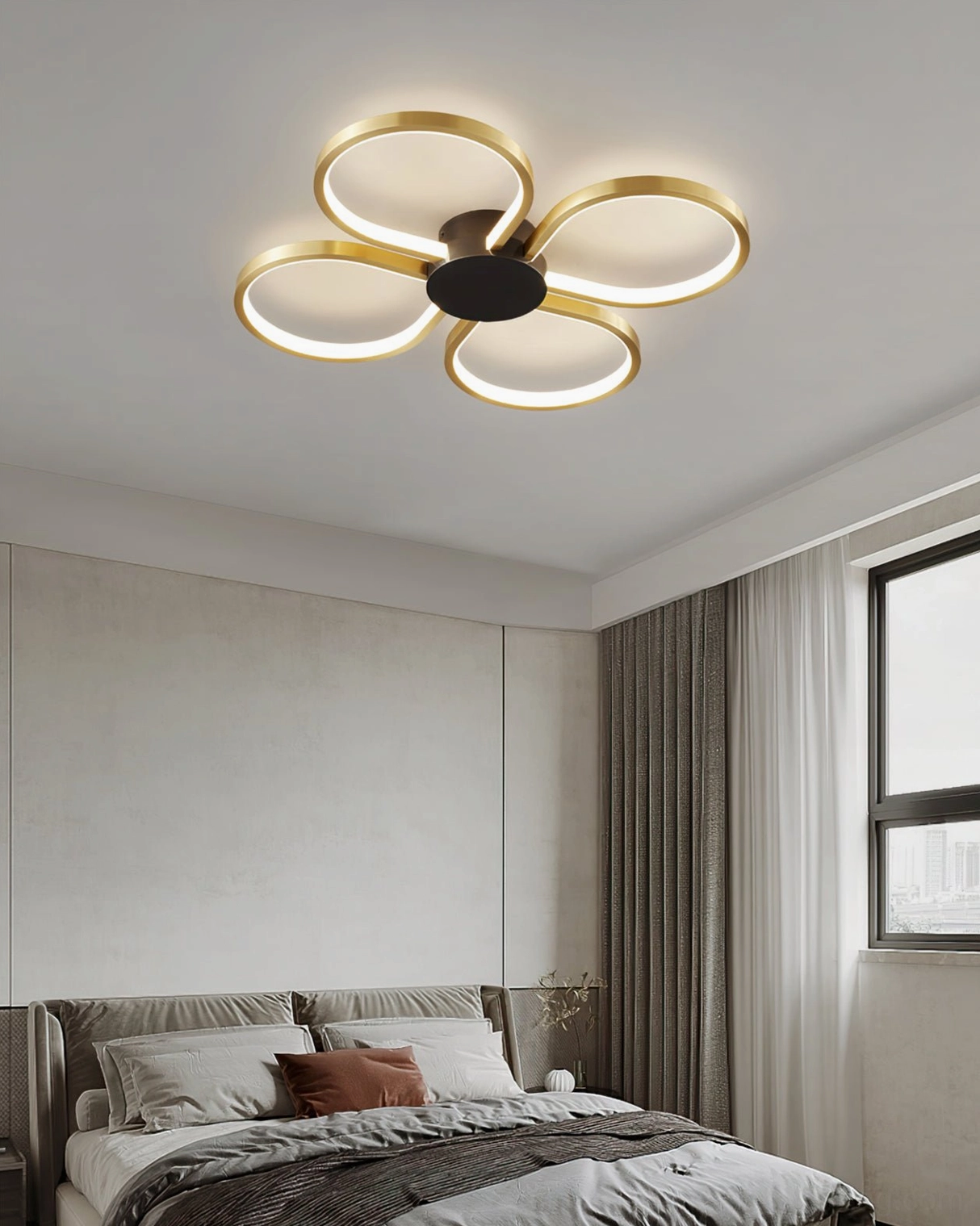 Orion ceiling lamp black and gold dual-tone finish, flat front studio view showing curved petal design and acrylic light panel