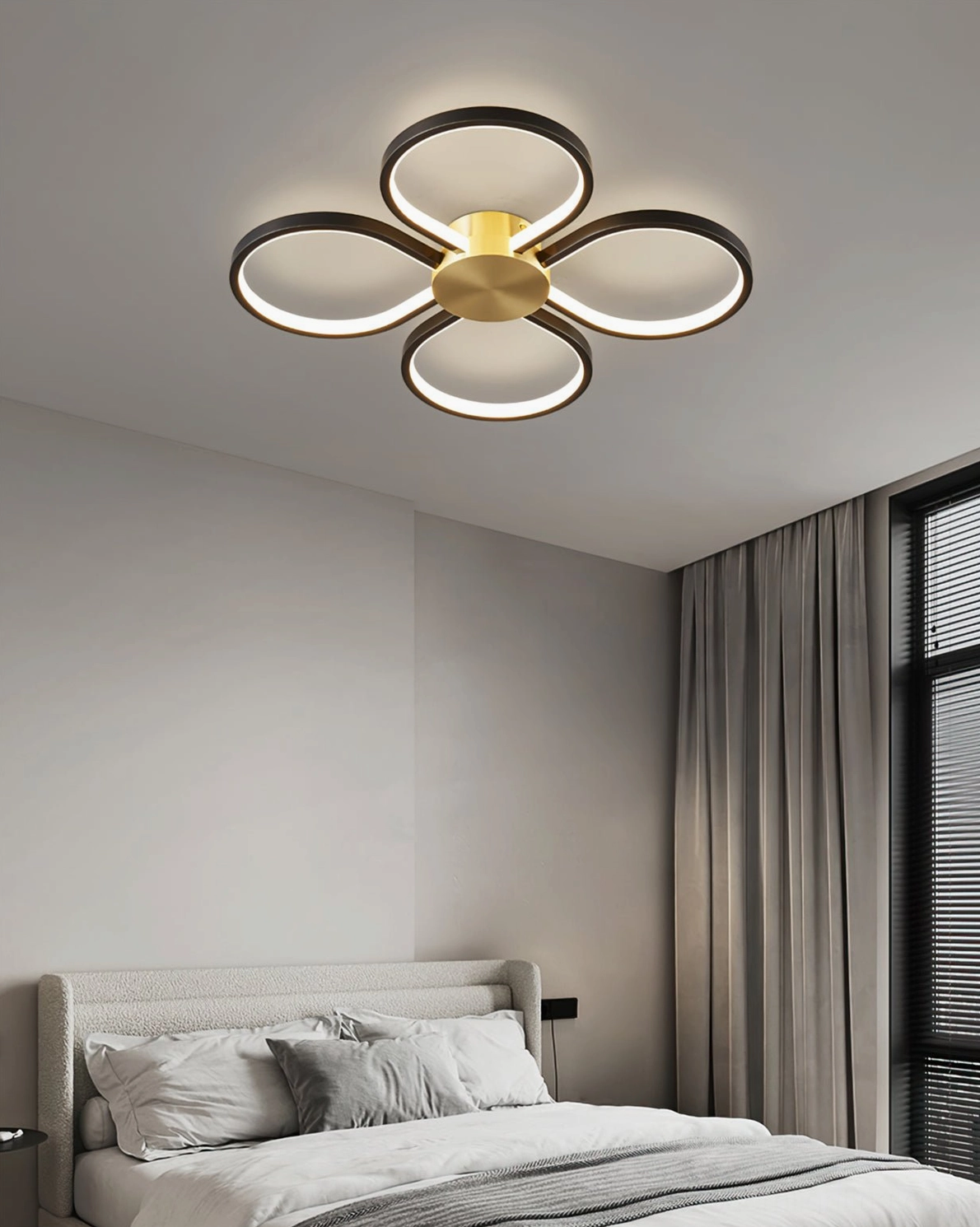 Orion modern LED ceiling lamp installed in contemporary bedroom with large window, warm light complementing muted neutral walls