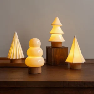 Orlo ceramic table lamp multiple size models showing proportional design variations on wooden table