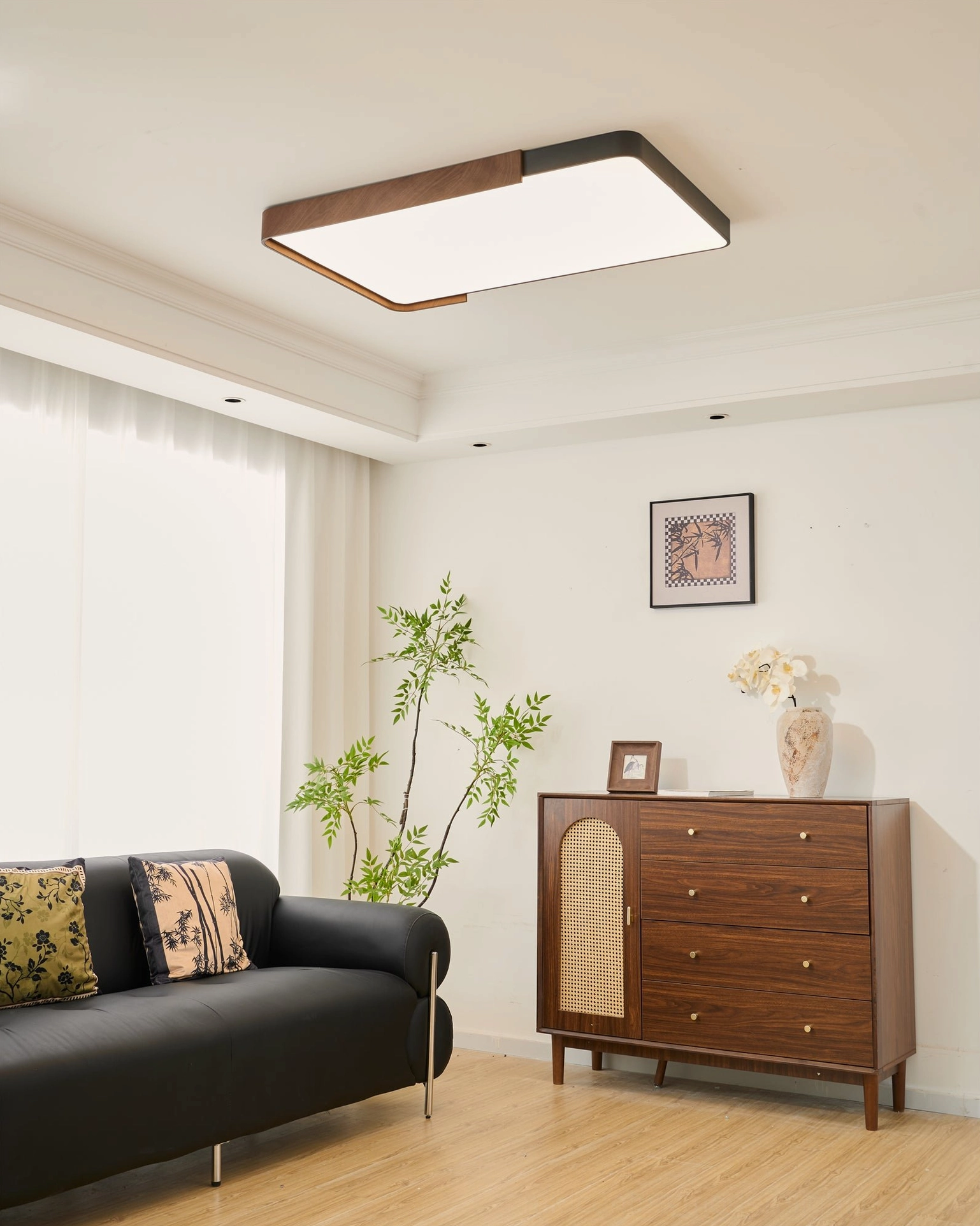 Orren ceiling light providing even diffused illumination in modern residential space overhead view