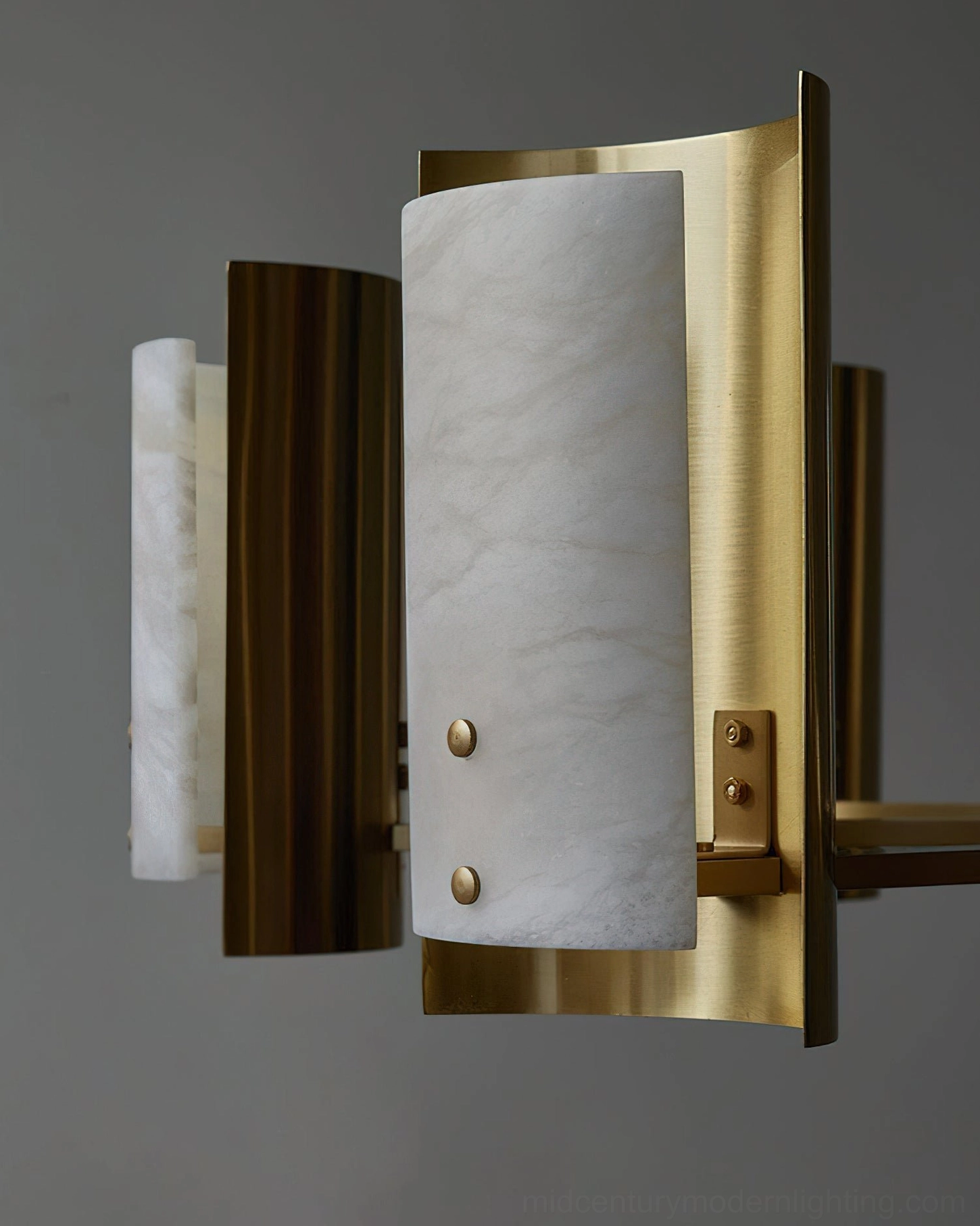 Osman alabaster brass wall sconce closeup, natural stone panel detail with brushed brass mounting hardware