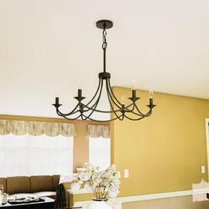 Ottuso chandelier installed above dining table in warm traditional living room with classic colonial design