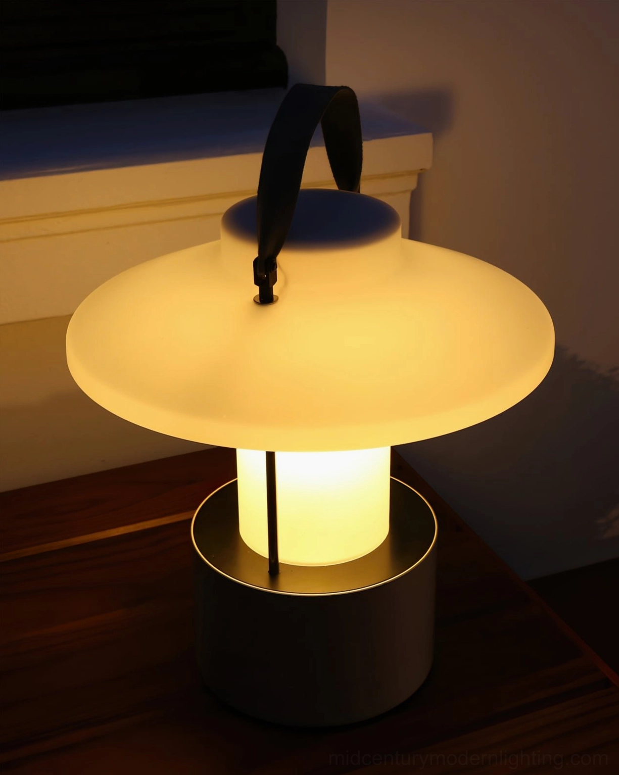 Claro outdoor lamp showcasing sleek cylindrical base and diffused lighting design