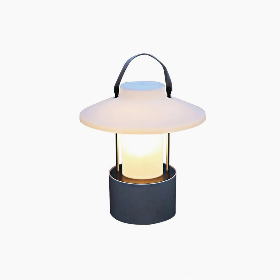 Cordless outdoor table lamp creating ambient evening glow in residential garden