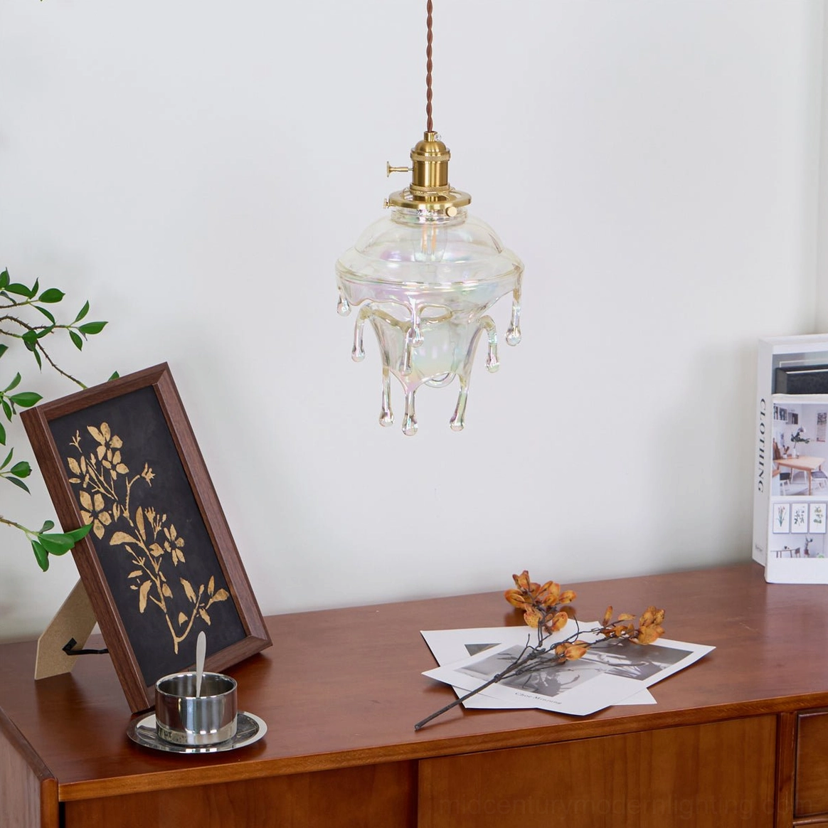 Overhead perspective of water droplets resin pendant suspended from ceiling