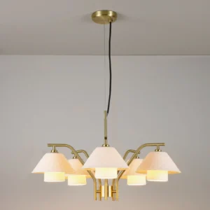 Brass pendant chandelier with dual bone china shades in minimalist white ceiling room, warm illuminated glow
