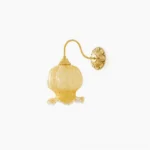 Ozera brass wall sconce with amber spotted glass shade front view on white background