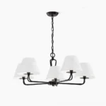 Ozias minimalist 5-head black metal chandelier with white fabric shades on white background, front view