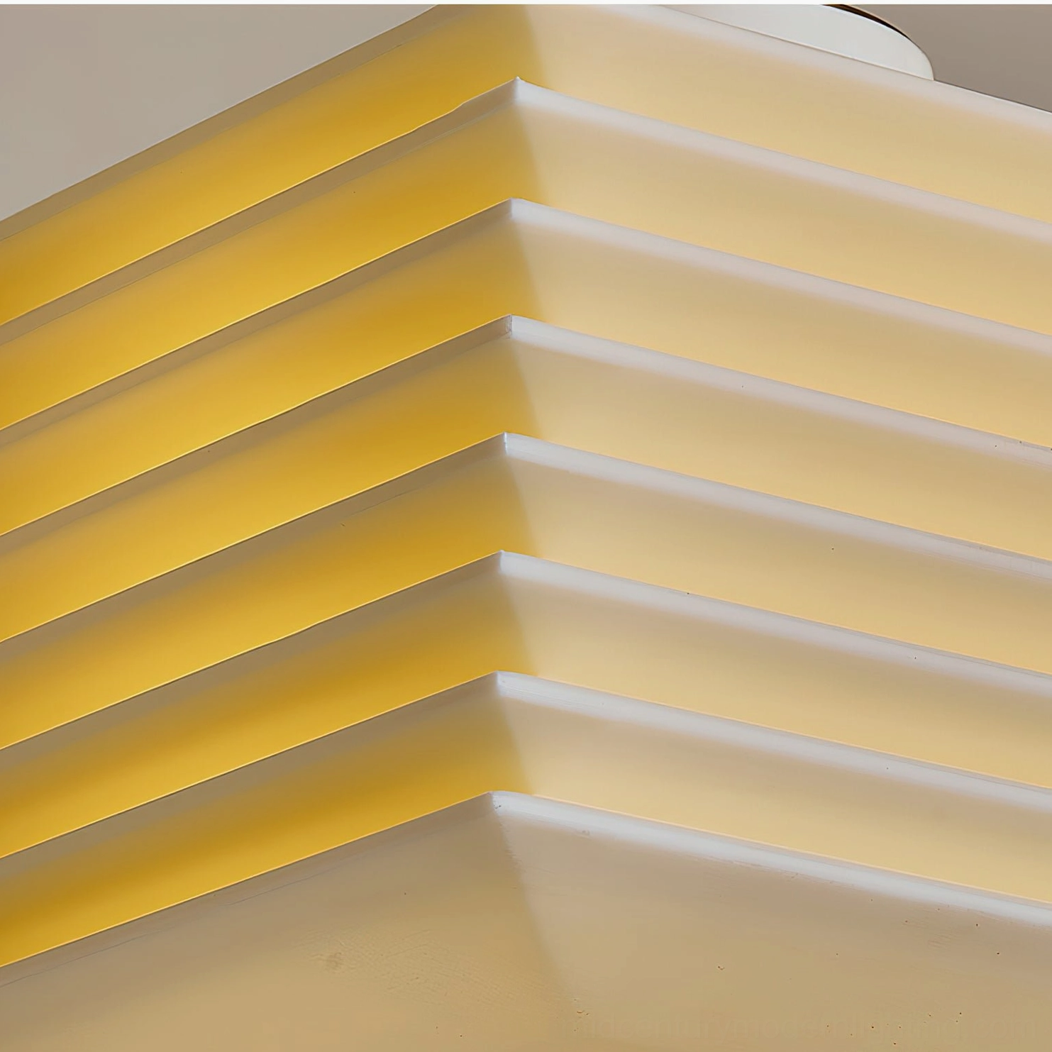 Extreme close-up of pagoda pendant lamp shade showing detailed ribbed texture and interior glow