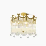 Palace crystal water drop ceiling lamp with brass frame and cascading crystal elements in studio lighting