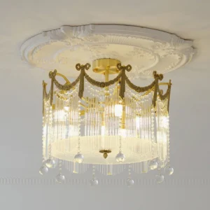 Crystal ceiling lamp installed on ornate palace-style ceiling with decorative gypsum trim
