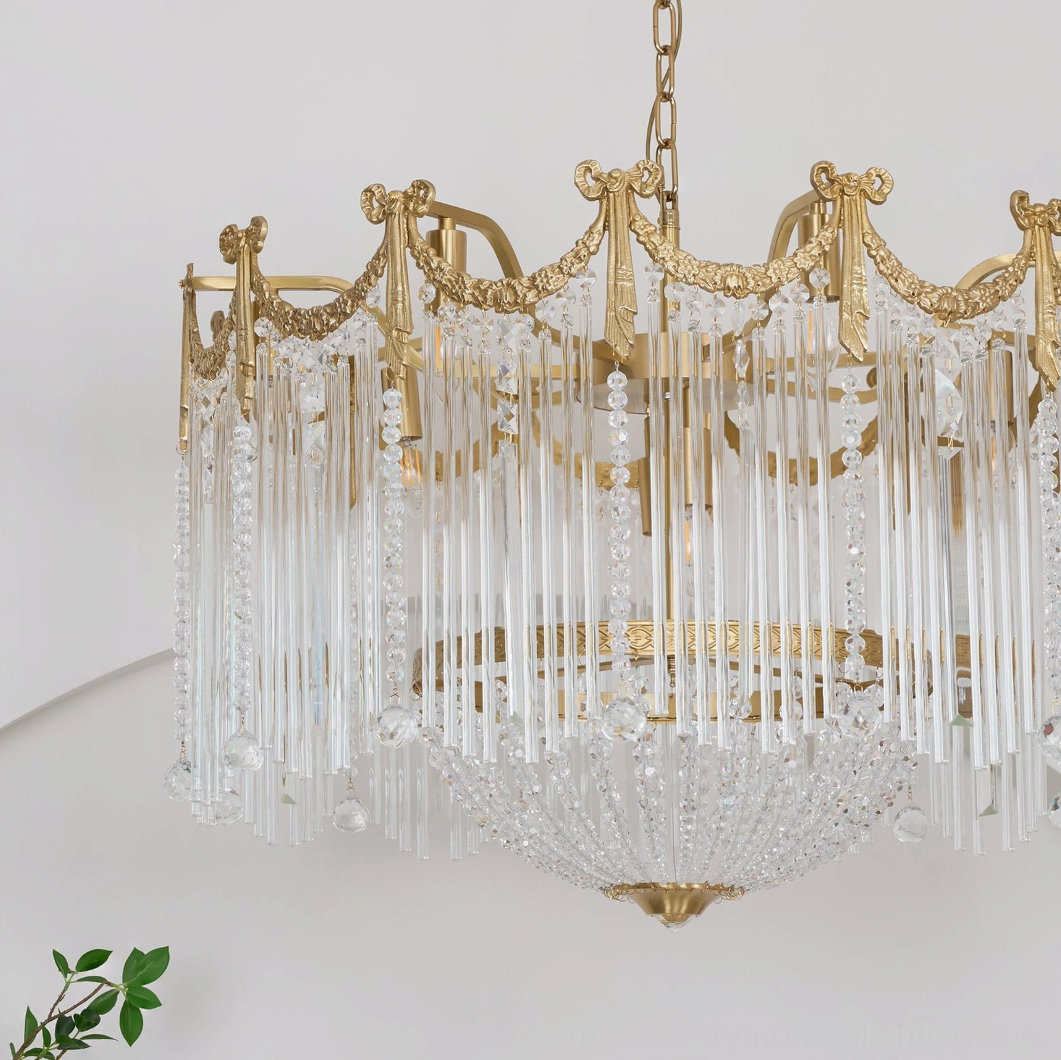 Close-up side-front view of palace-style crystal chandelier showing detailed crown metal frame and long glass pendants