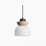 Palak pendant light modern minimalist design with white glass shade travertine stone ring and warm wood accent front view