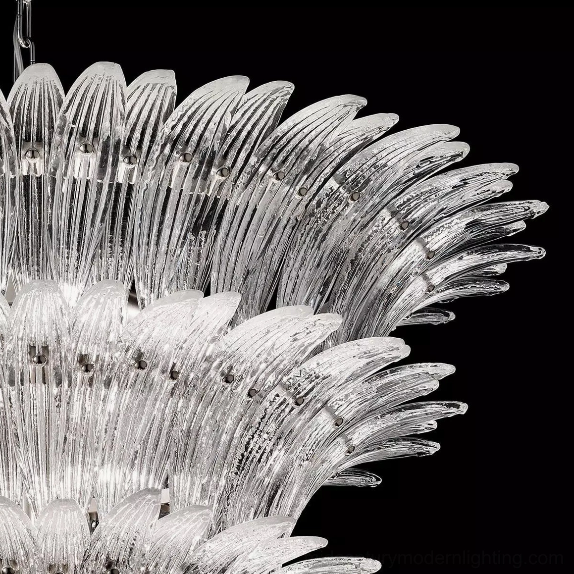 Extreme close-up macro photography of Palazzo chandelier radial layered fluted glass texture and light refraction